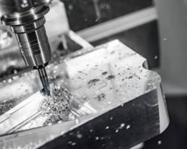 CNC machining metal part with a multi-axis milling machine, illustrating the precision of machining milling services.
